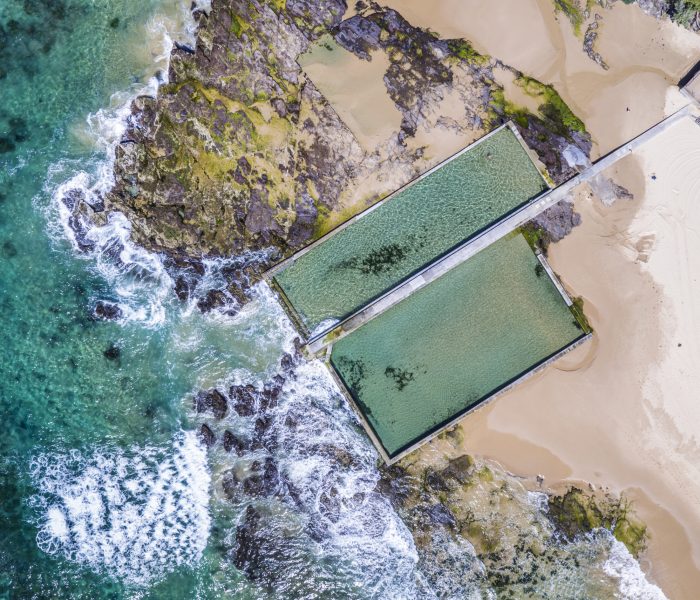 Aerial overlooking Austinmer Ocean Pools, Austinmer Beach.
